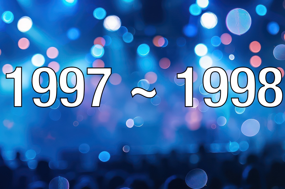 1997 ~ 1998 text over a blue blurred lights background